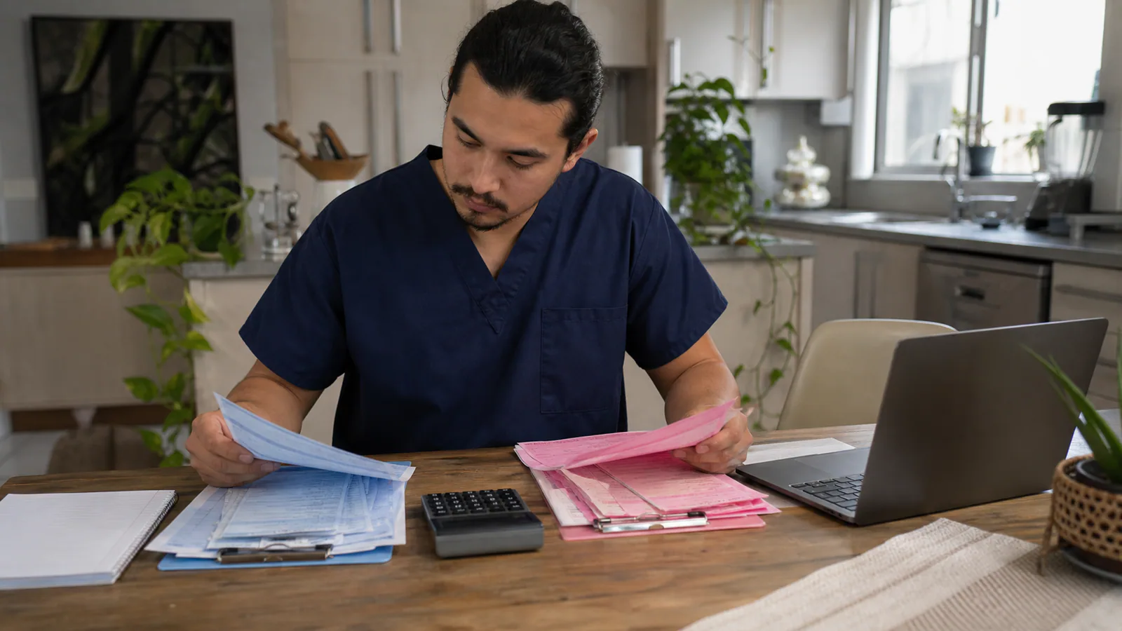 Illustrative editorial scene of a worker separating earnings records from healthcare and retail jobs for a two-job calculation.